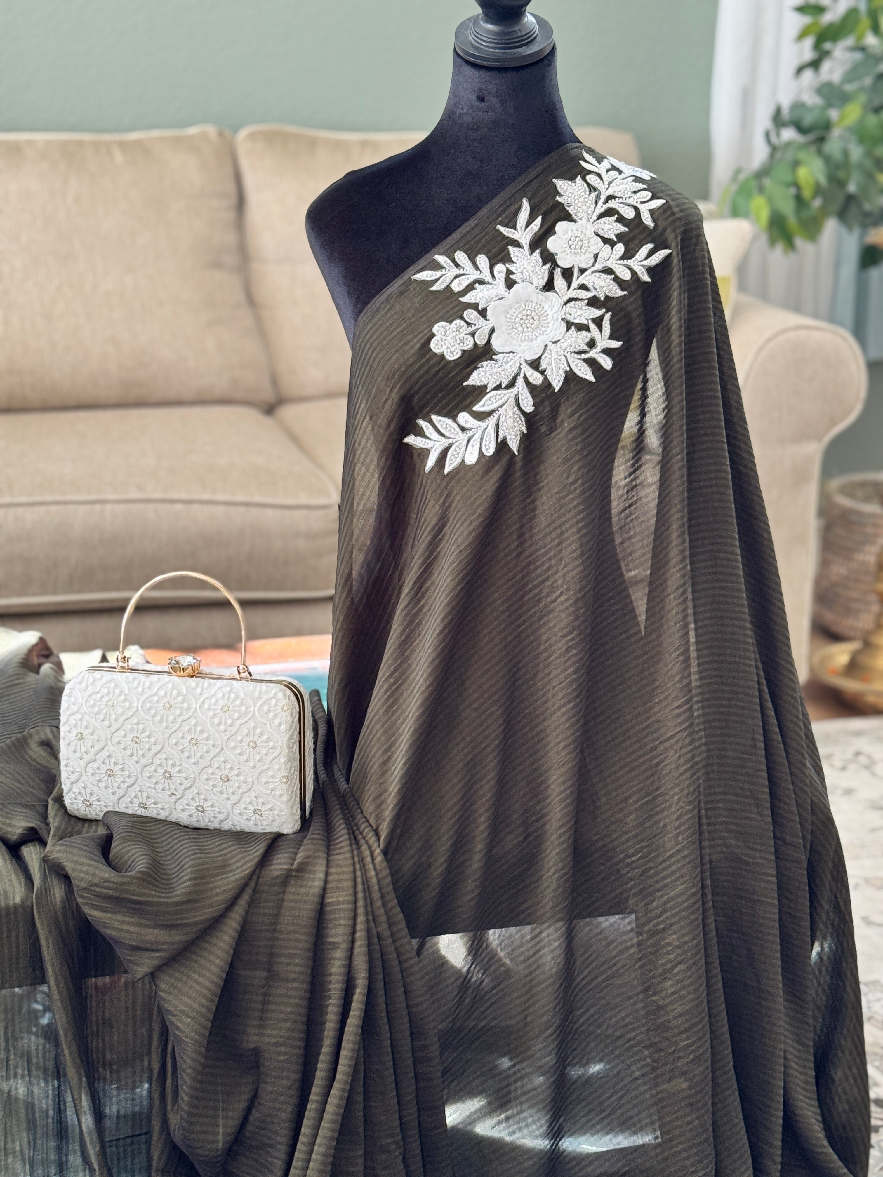 Black saree with white patch