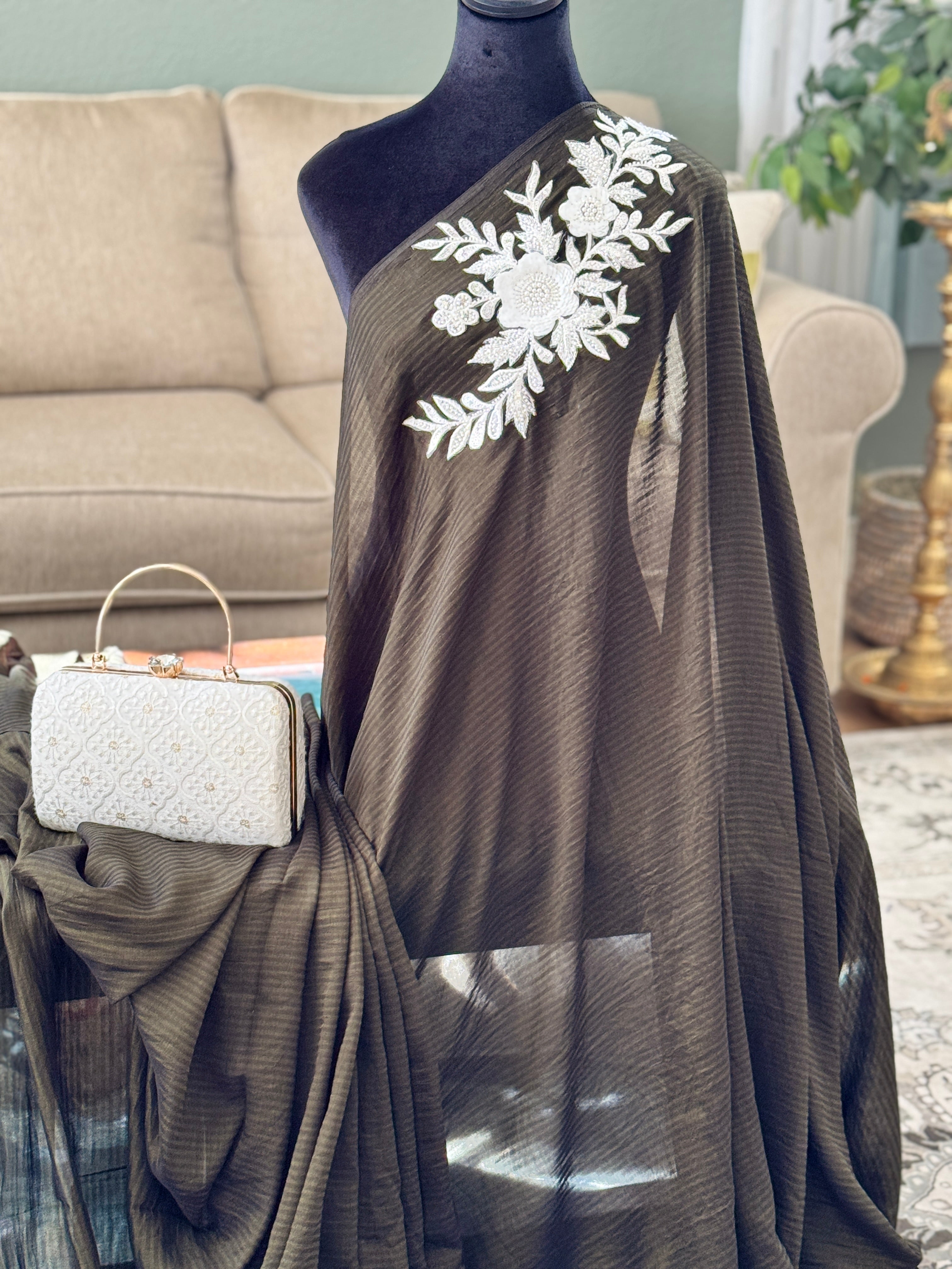 Black saree with white patch