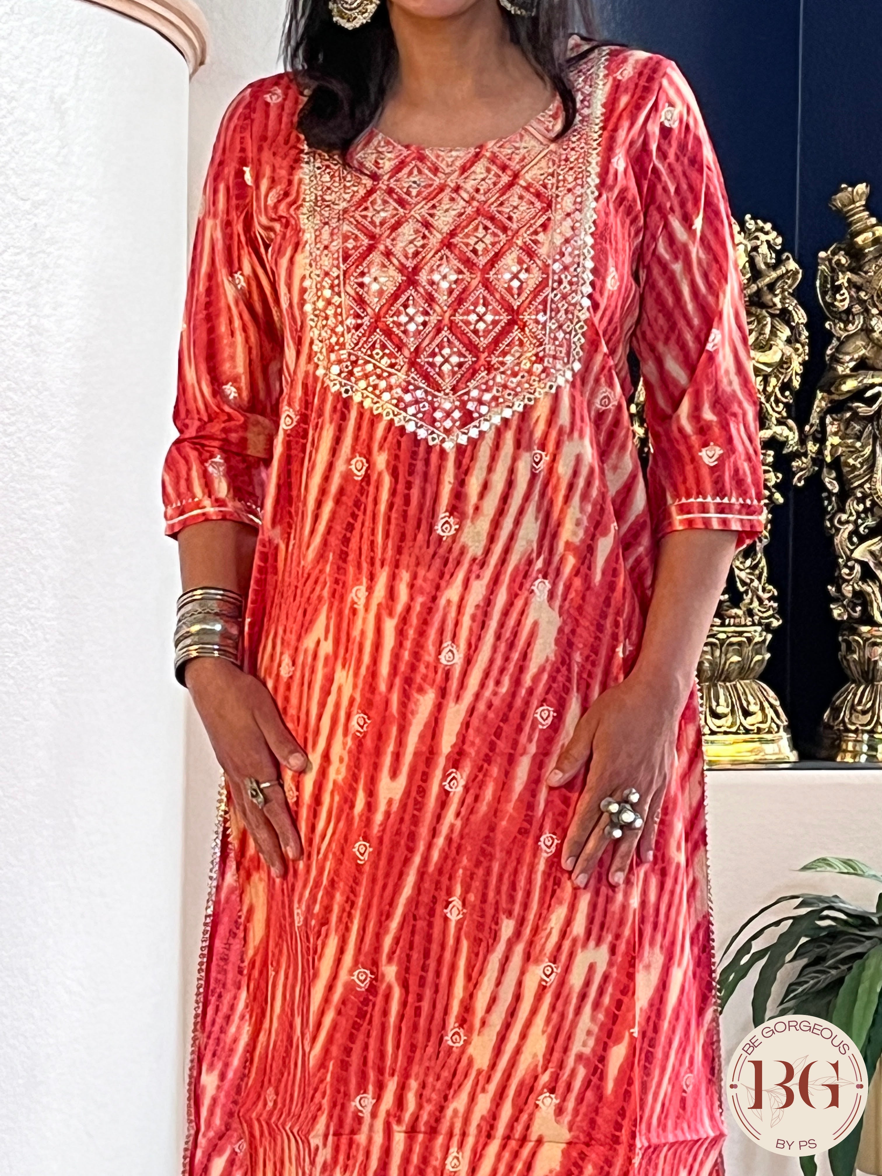 Beautiful kurti in gajri color with mirror and gota detailing