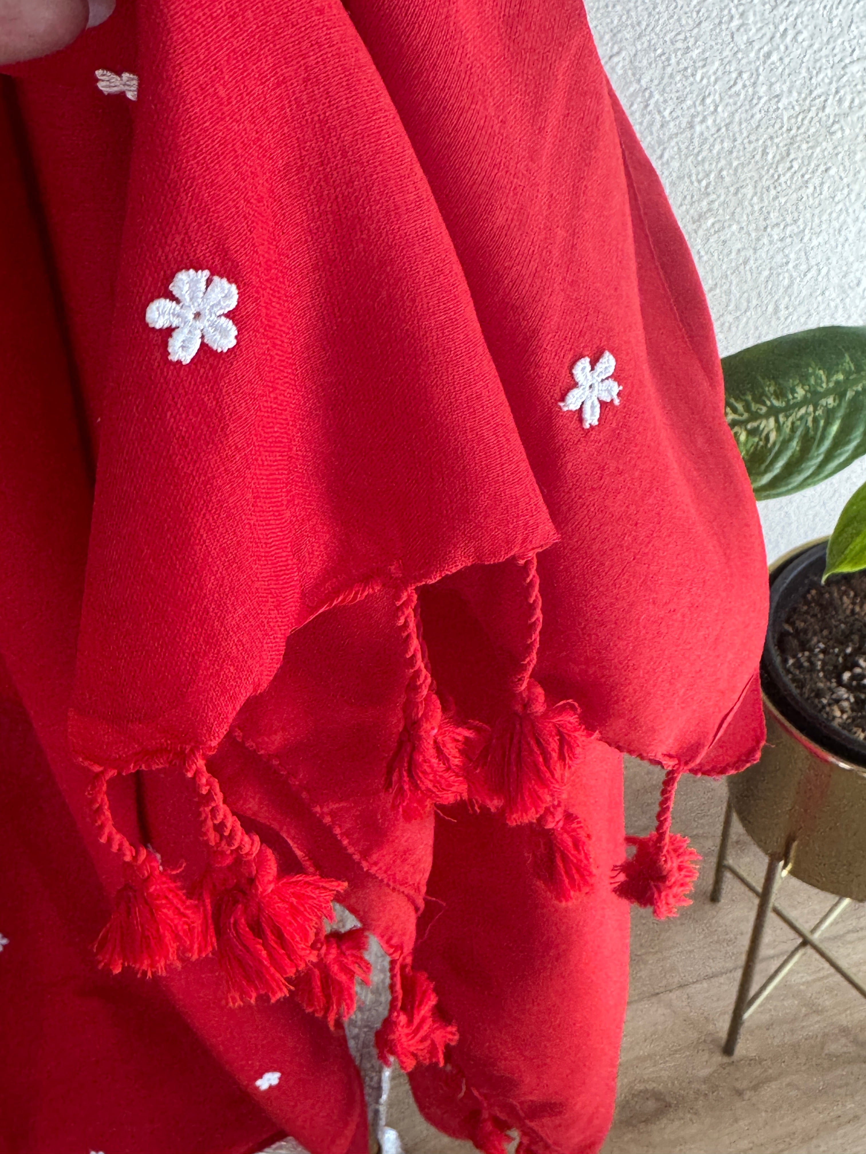Red cotton saree with small white flowers