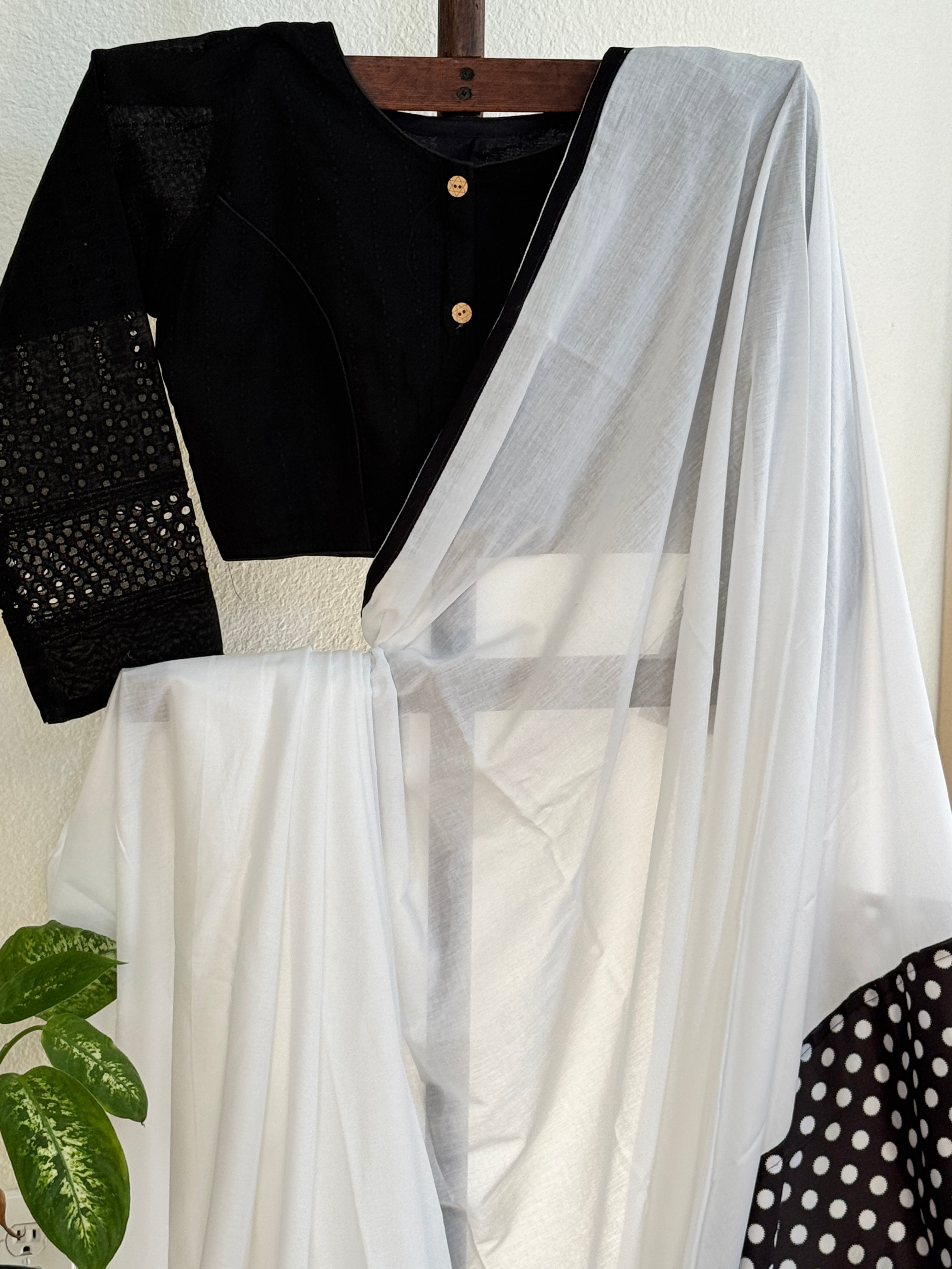 White cotton saree with black polka pallu