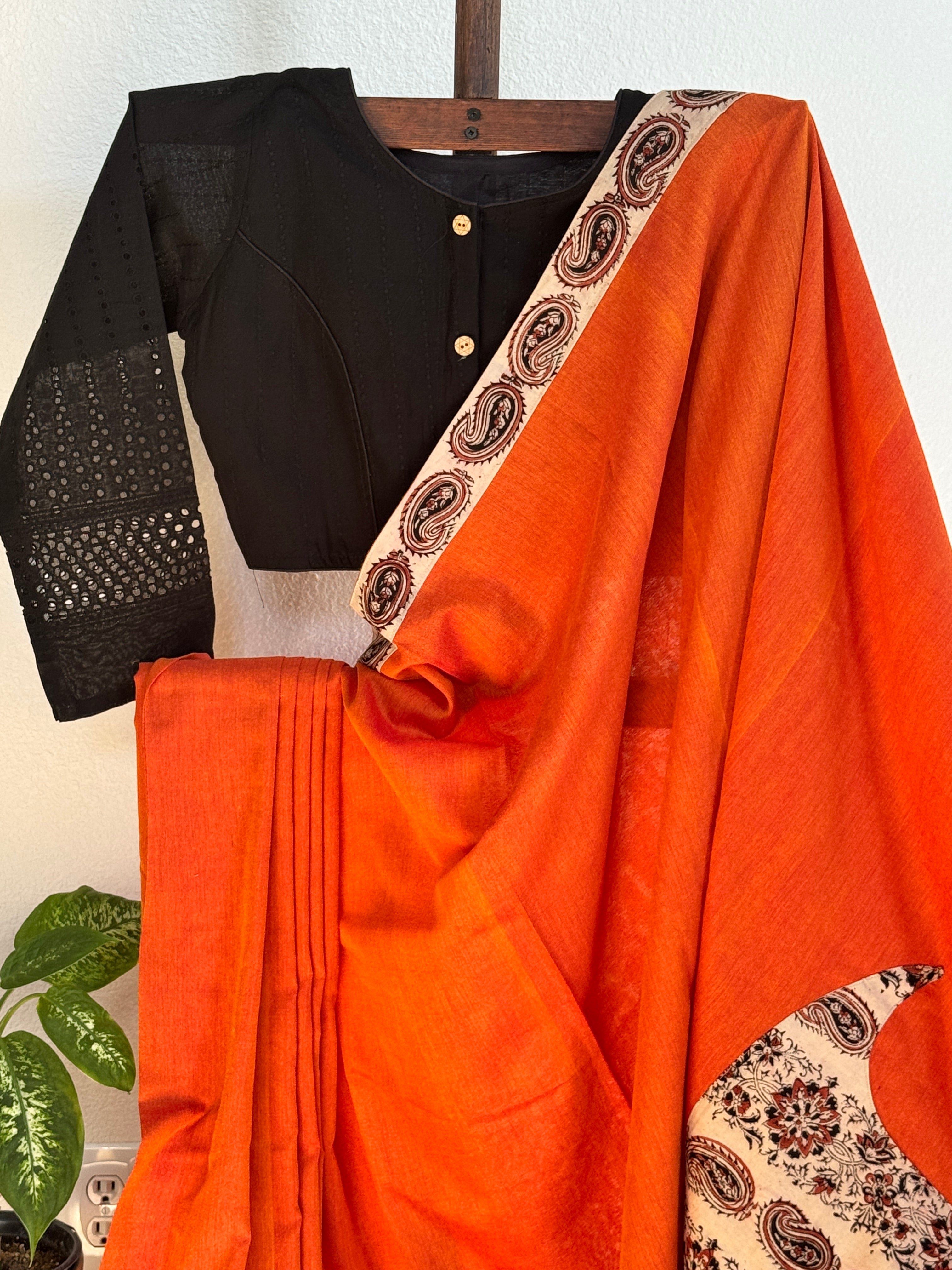 Orange cotton saree with mango border and pallu