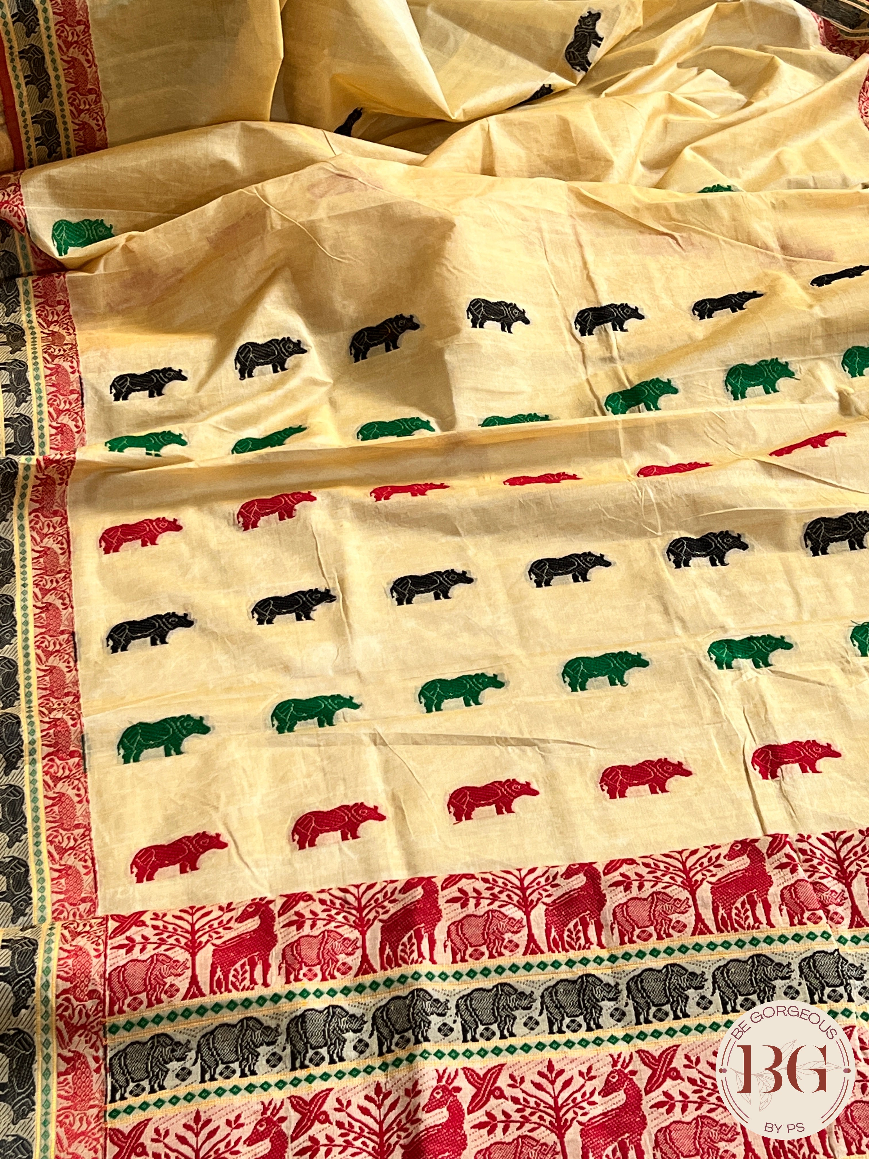 Kaziranga Assam Cotton Blend Saree in CREAM RED color with rhino motifs