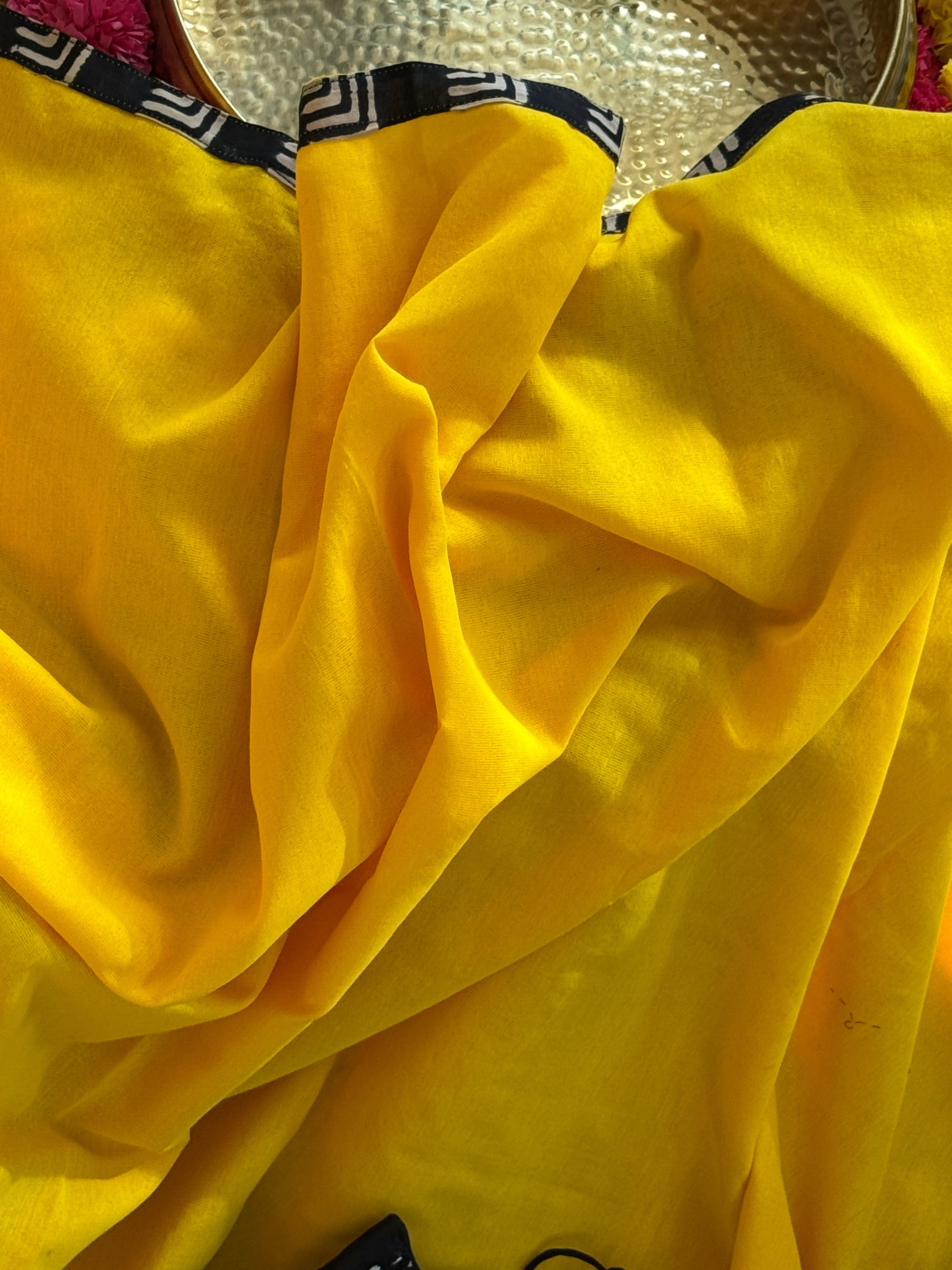 Yellow cotton with black border