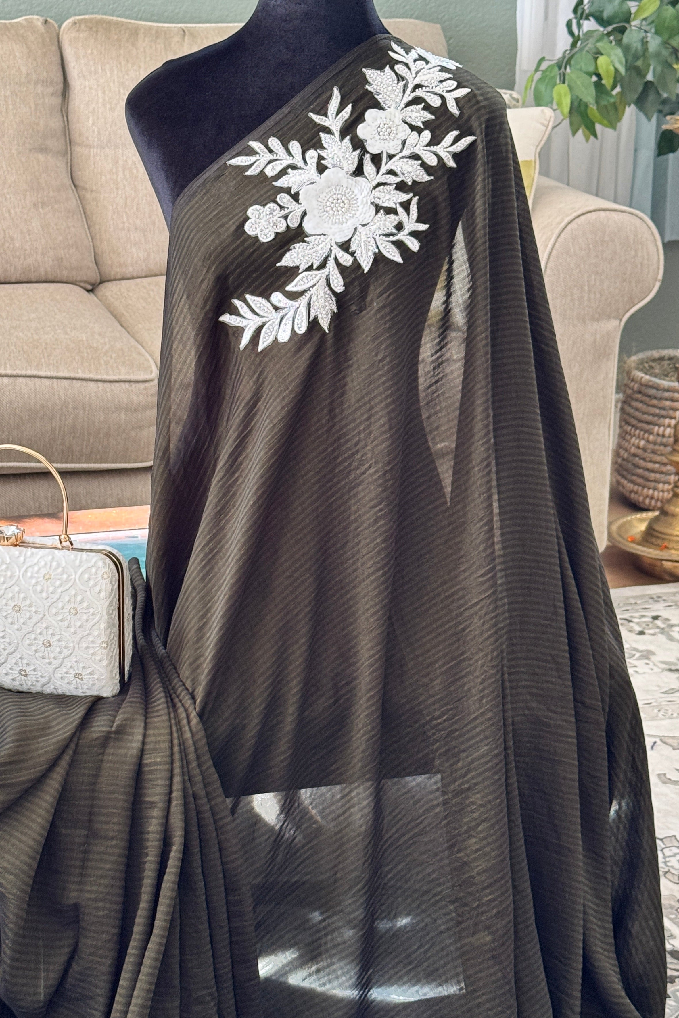 Black saree with white patch