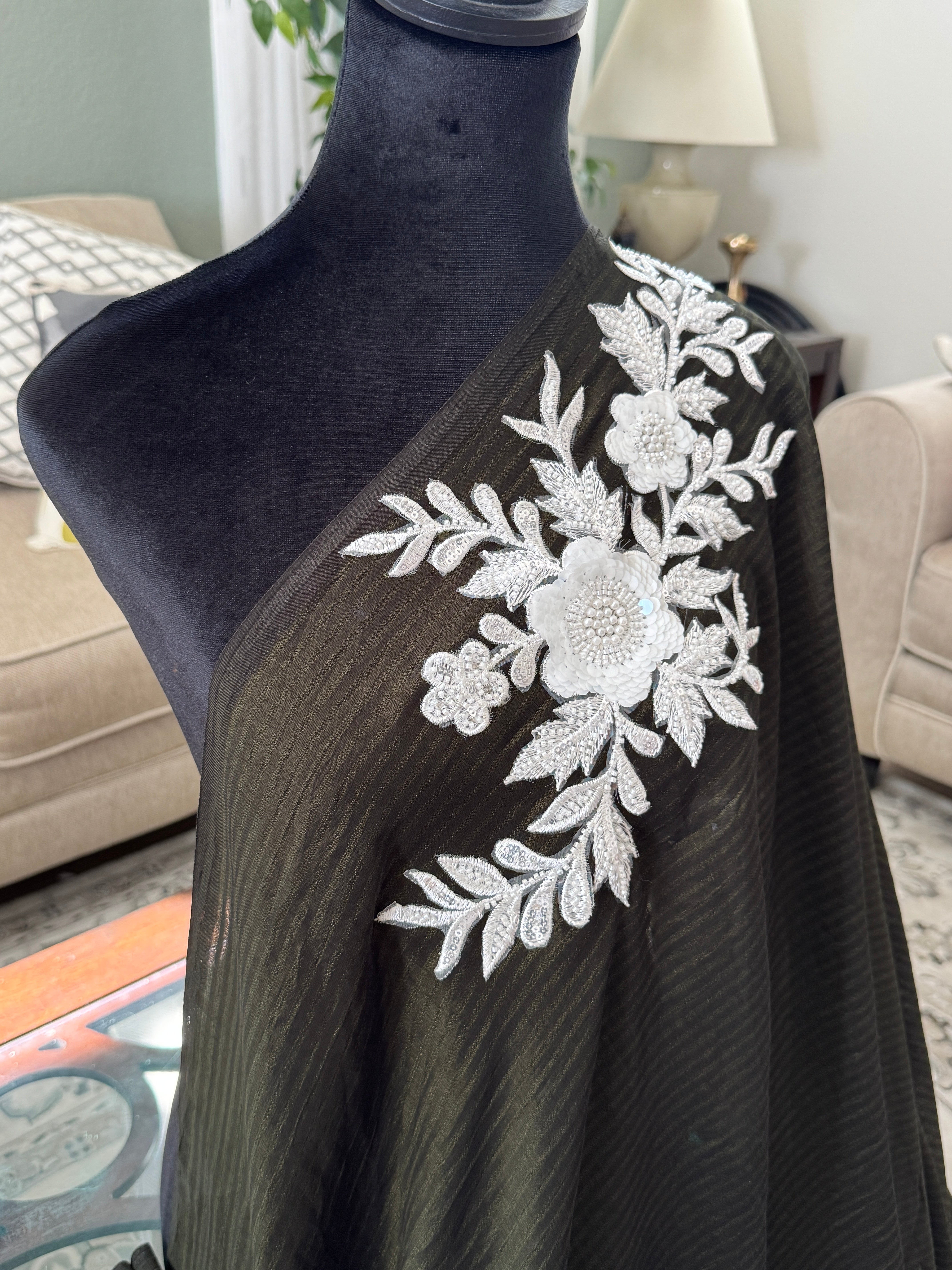 Black saree with white patch