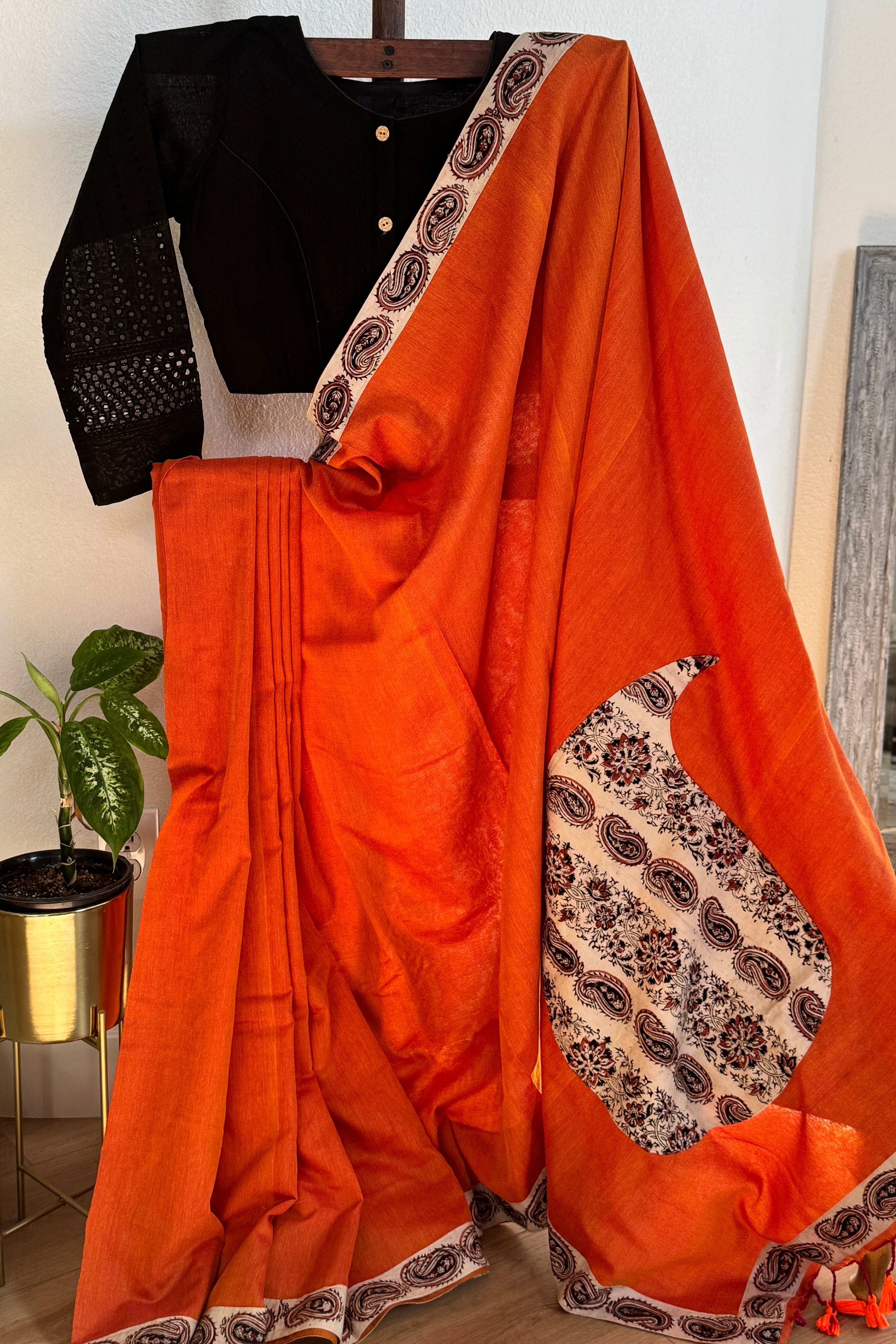 Orange cotton saree with mango border and pallu