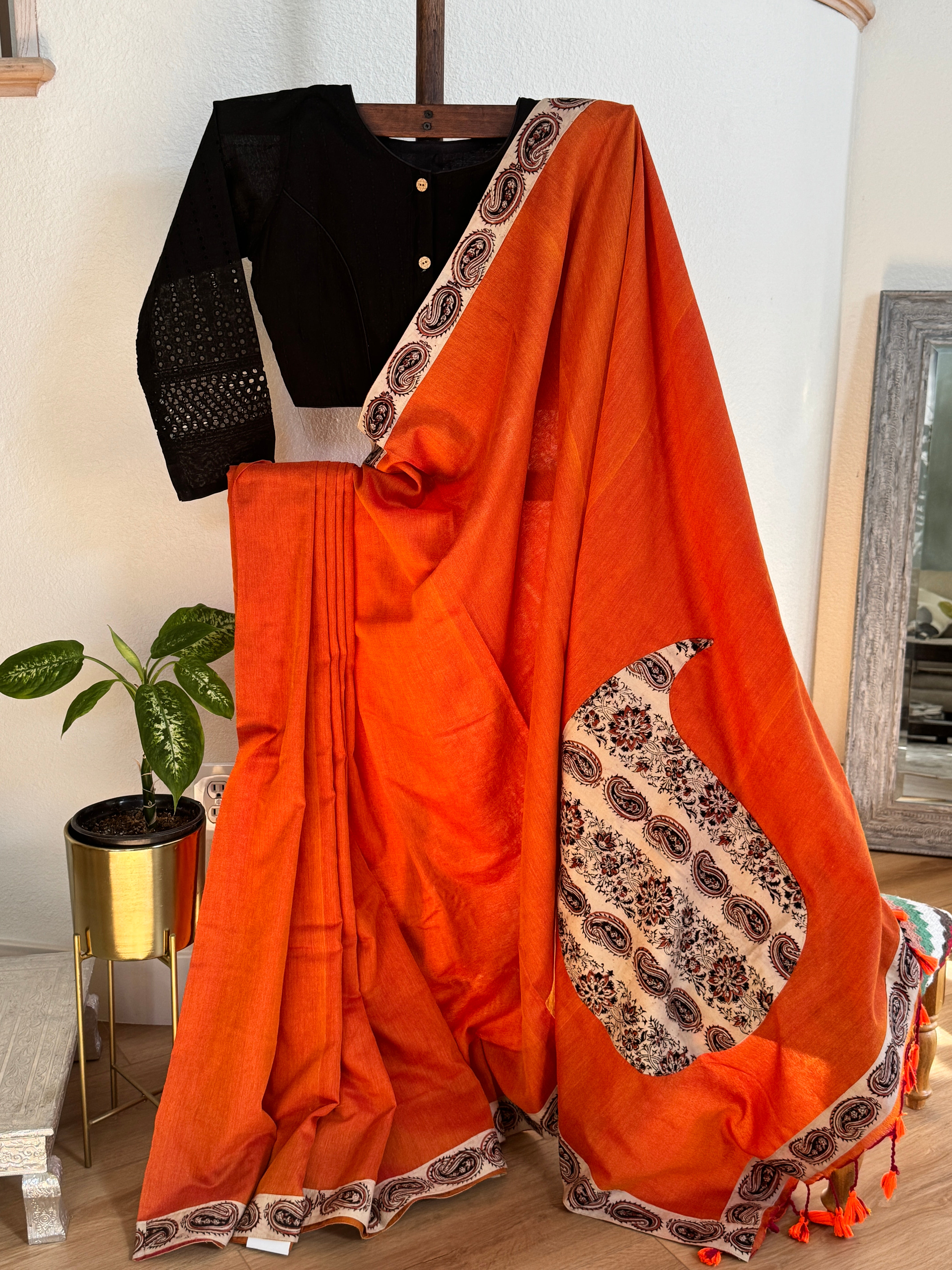 Orange cotton saree with mango border and pallu