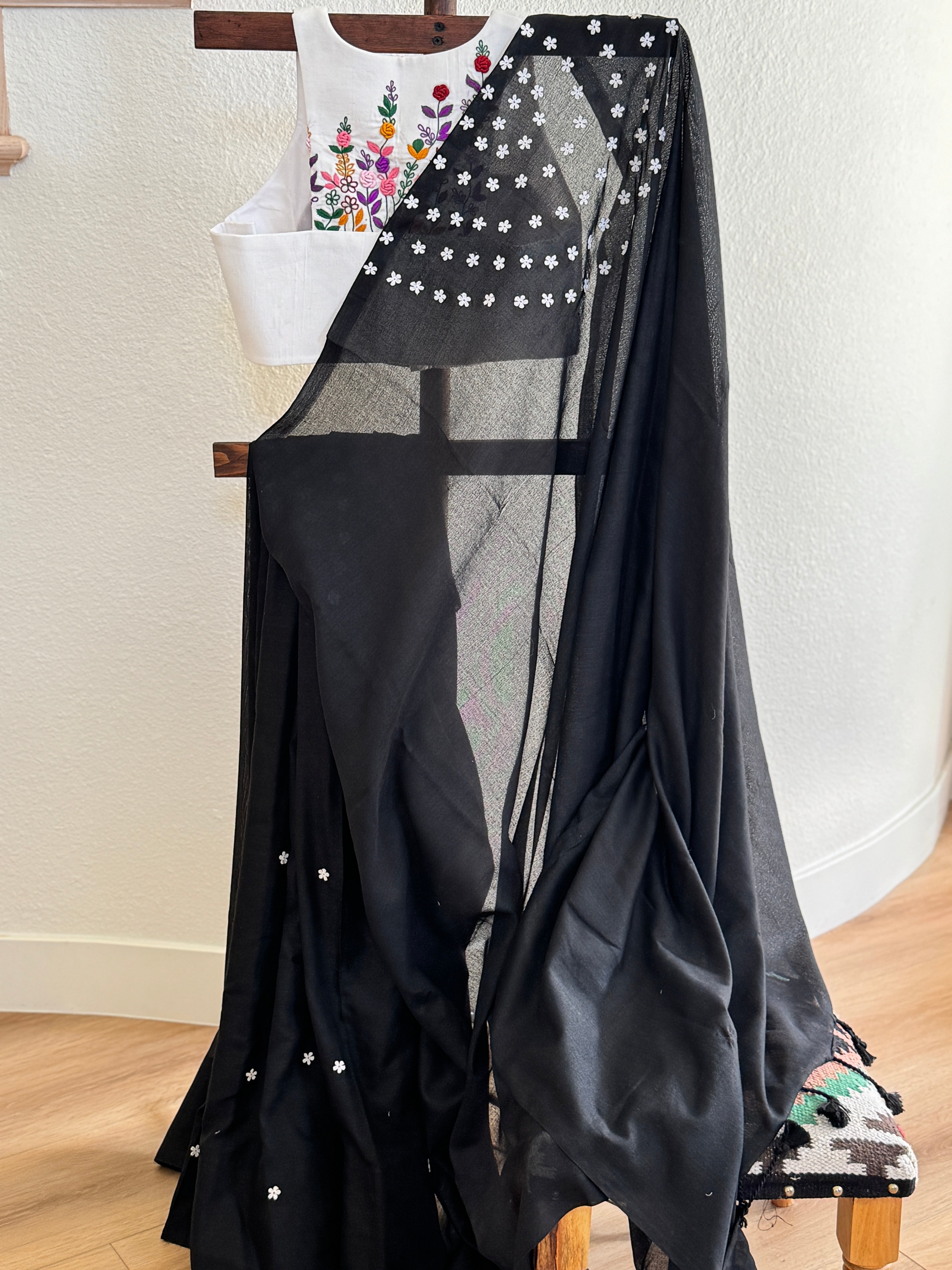 Black cotton with small white flowers