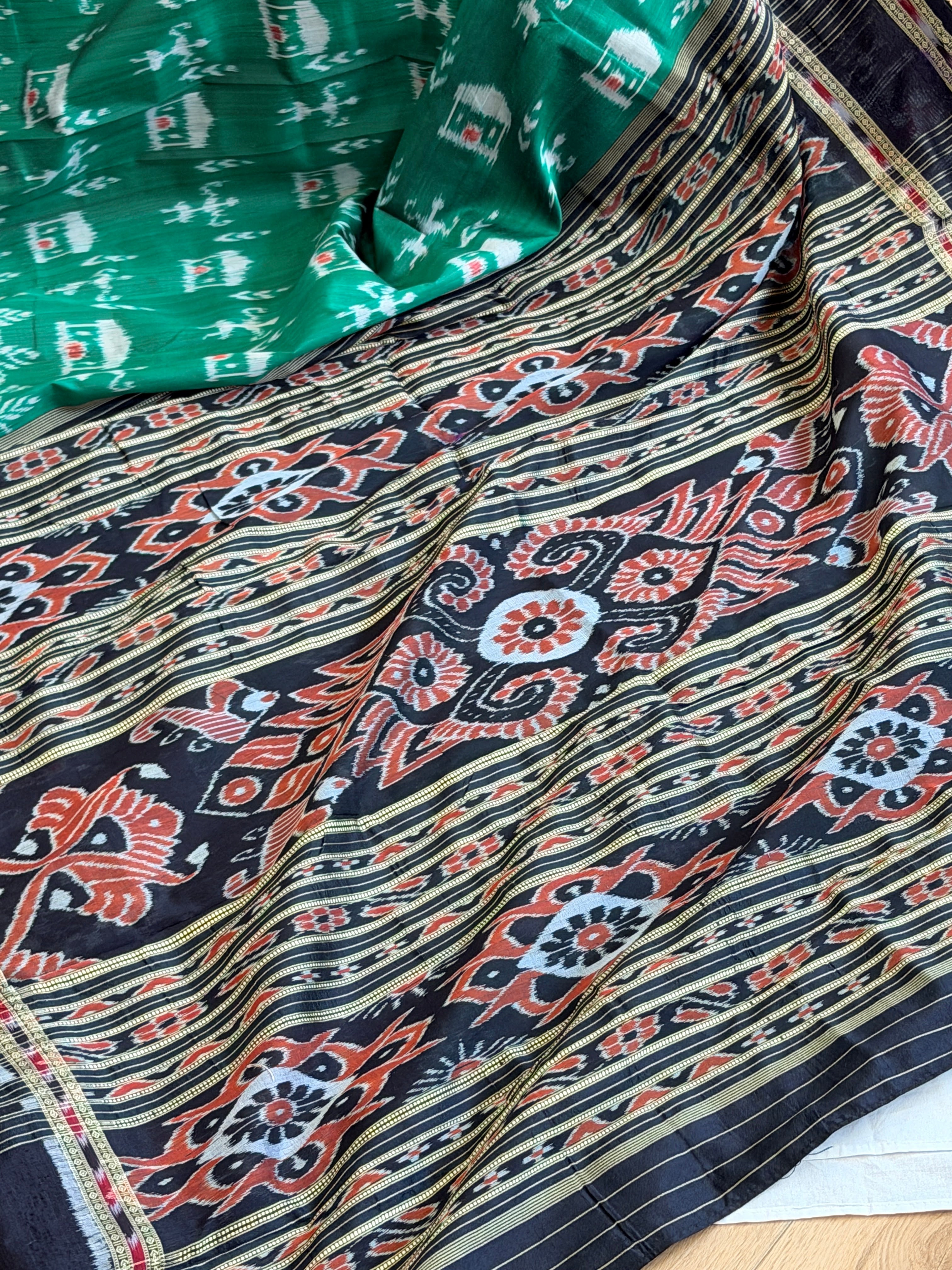 Green black tribal design khandua silk saree