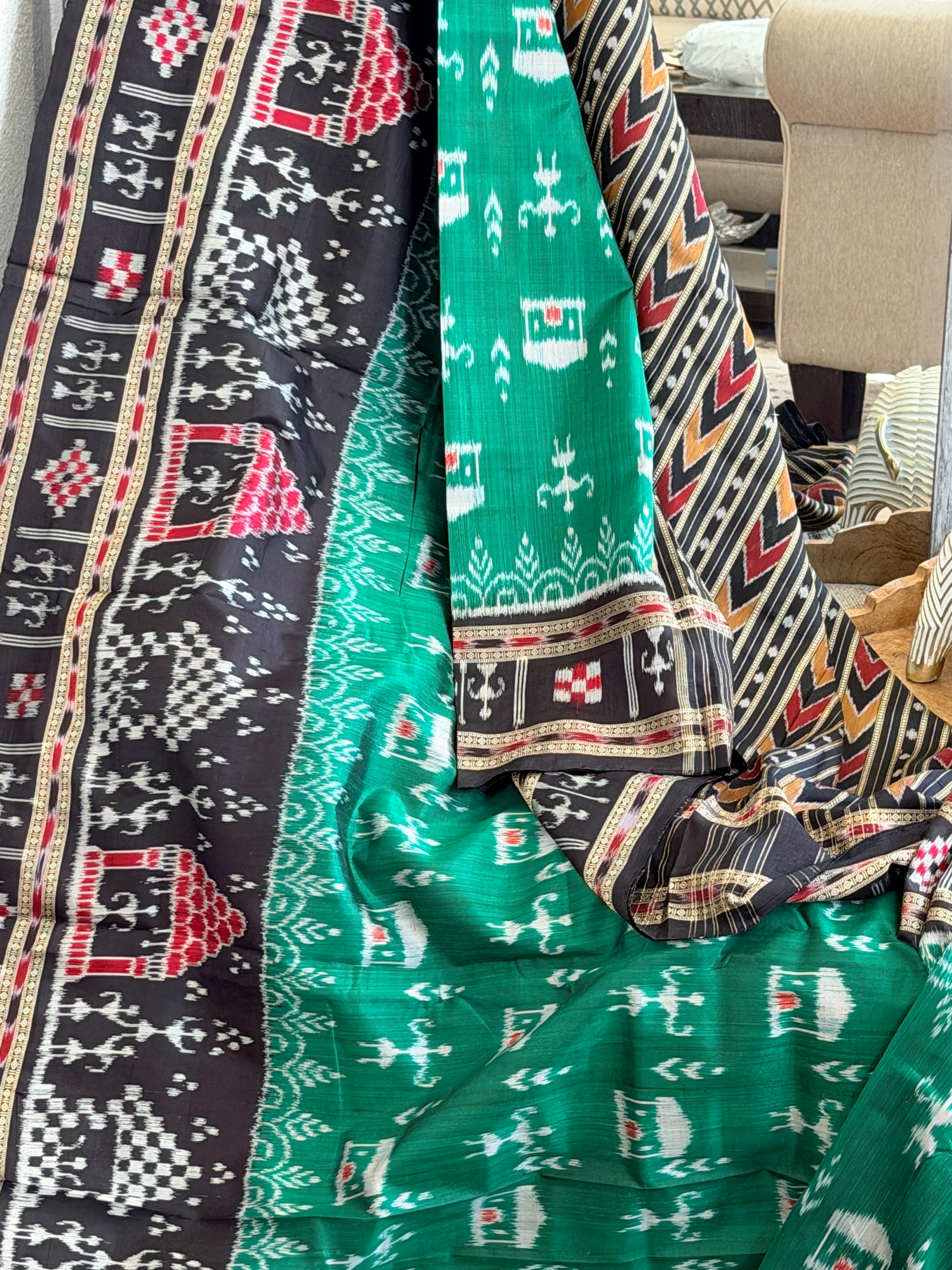 Green black tribal design khandua silk saree