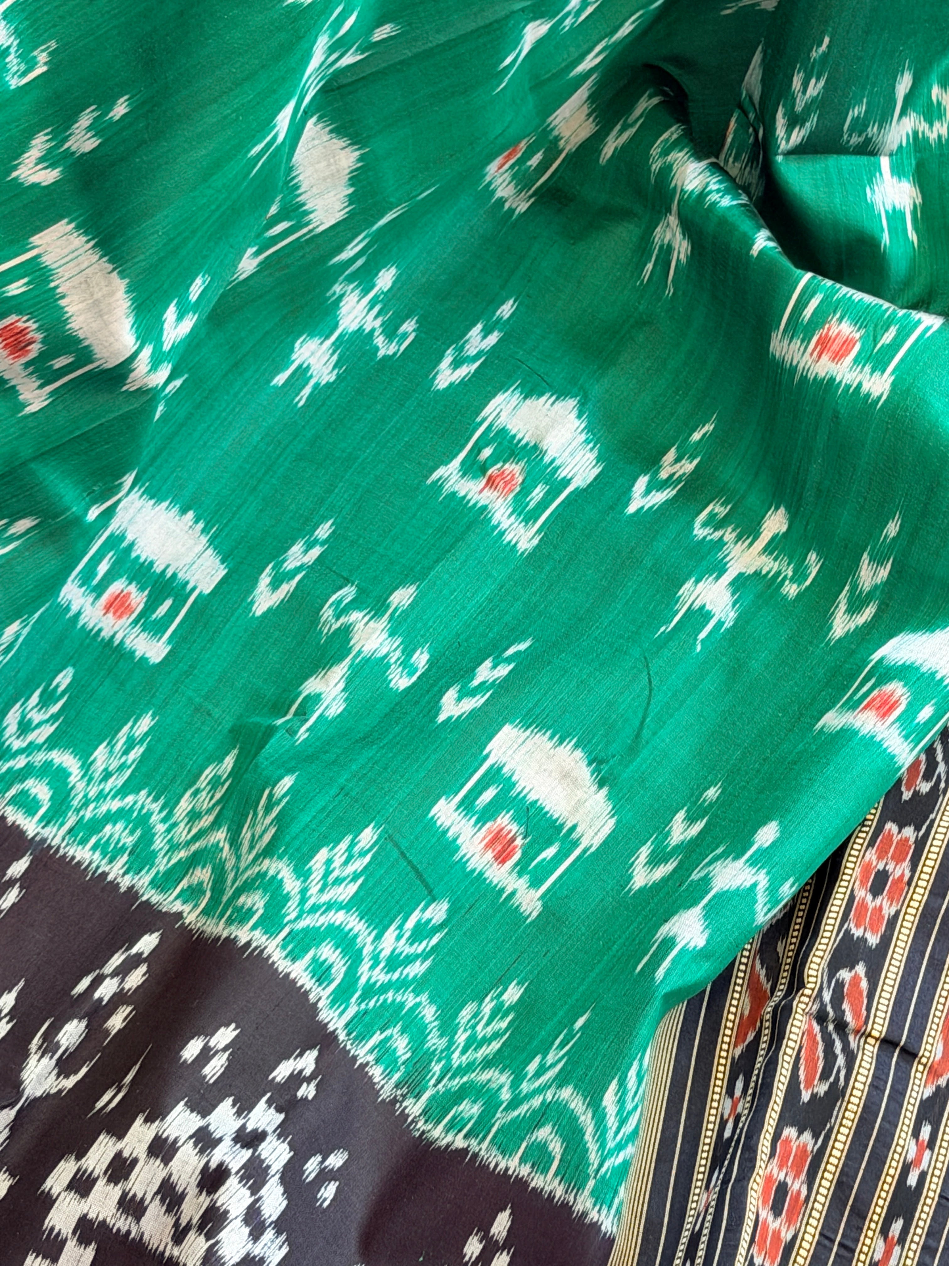 Green black tribal design khandua silk saree