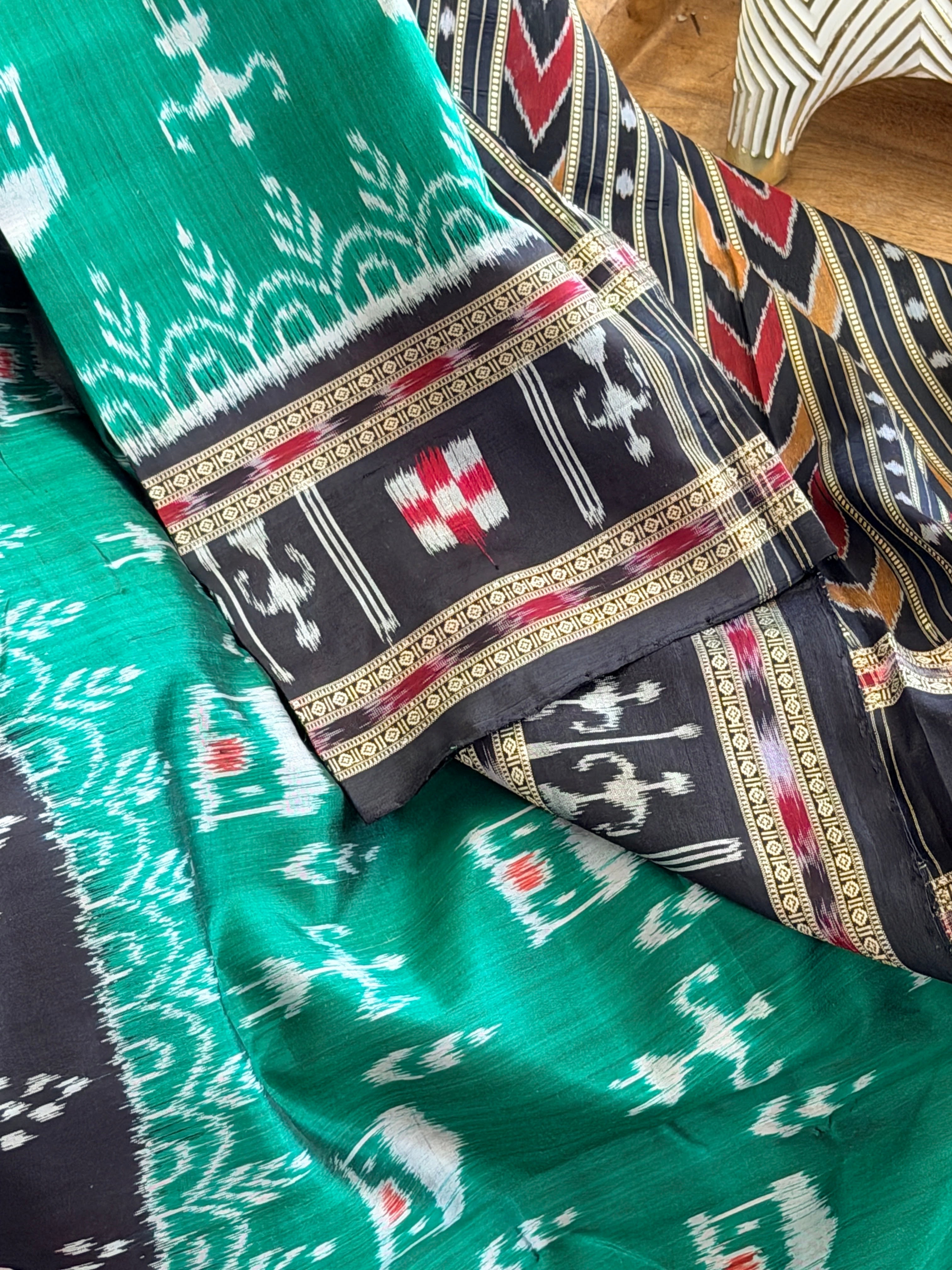 Green black tribal design khandua silk saree