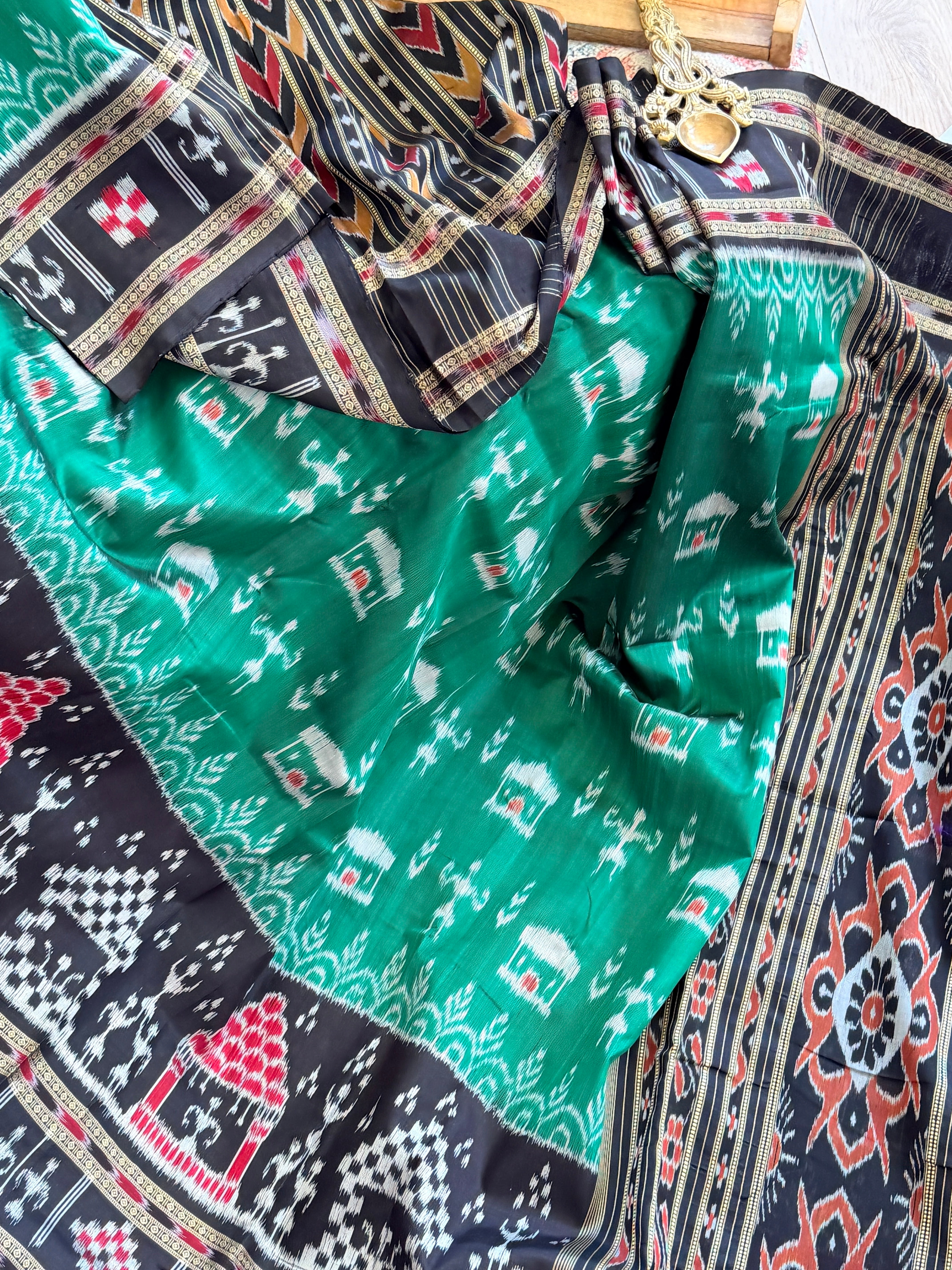 Green black tribal design khandua silk saree