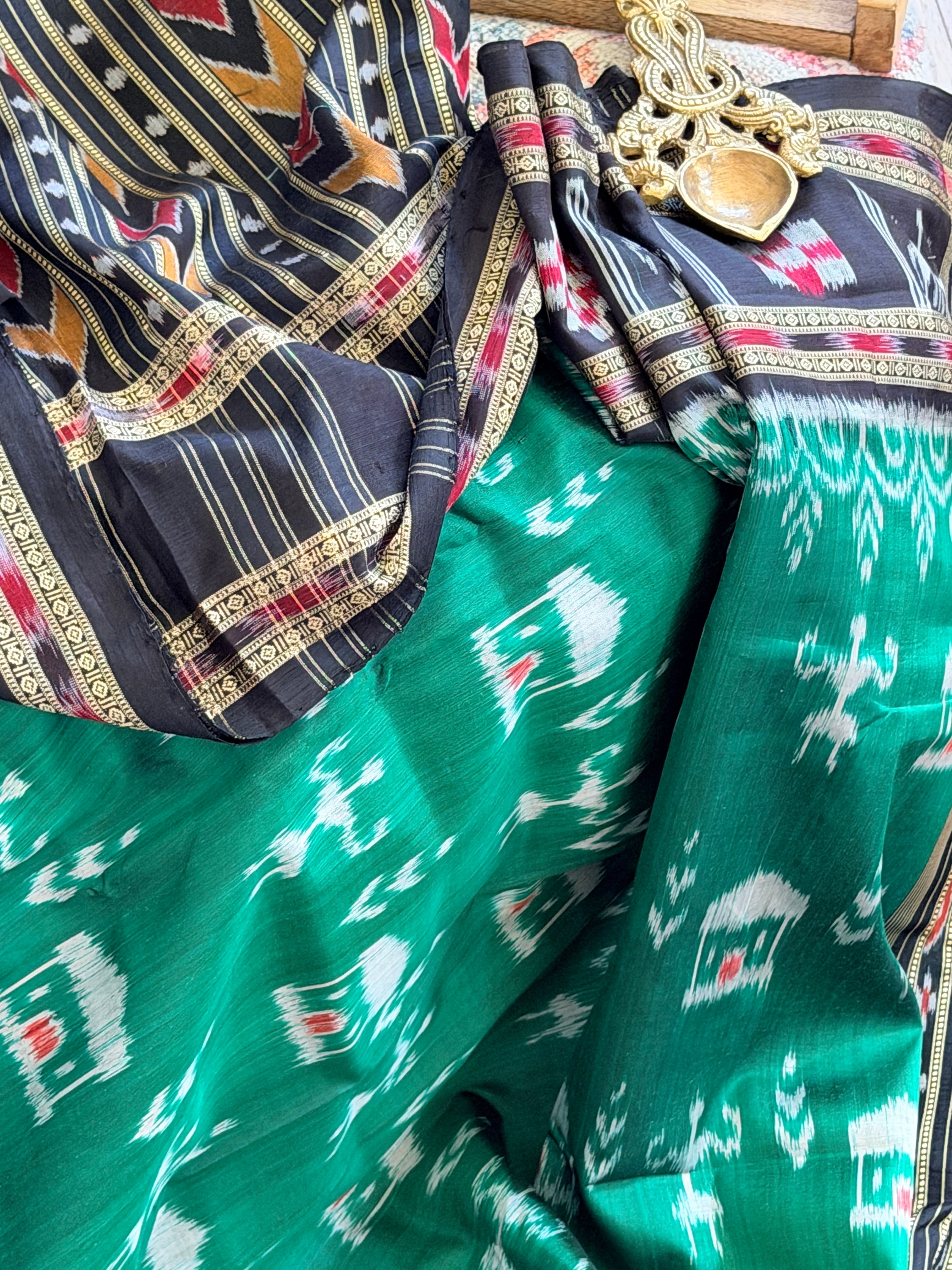 Green black tribal design khandua silk saree